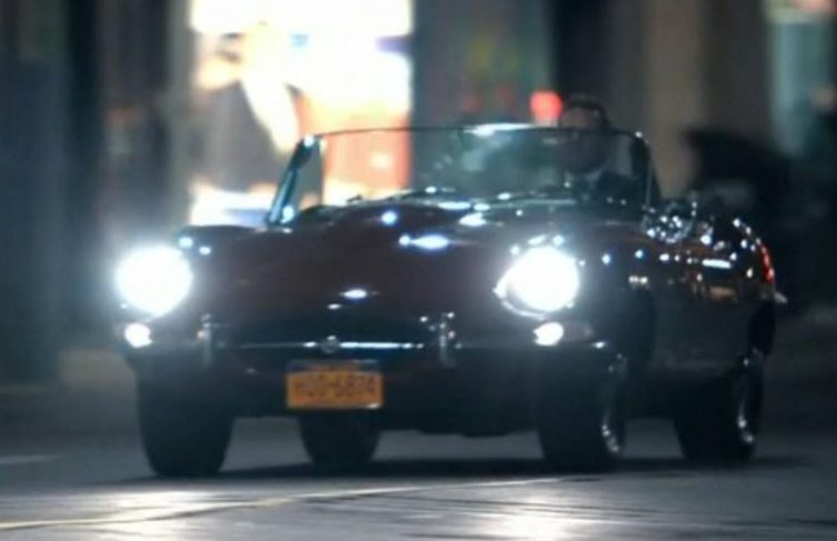 Harvey Specter in an E-Type Jaguar car