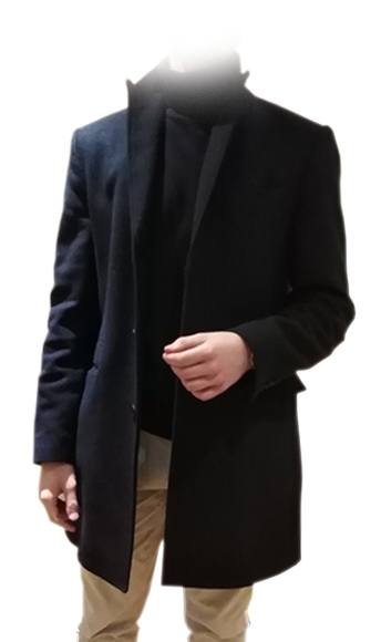 A man wearing a grey coat